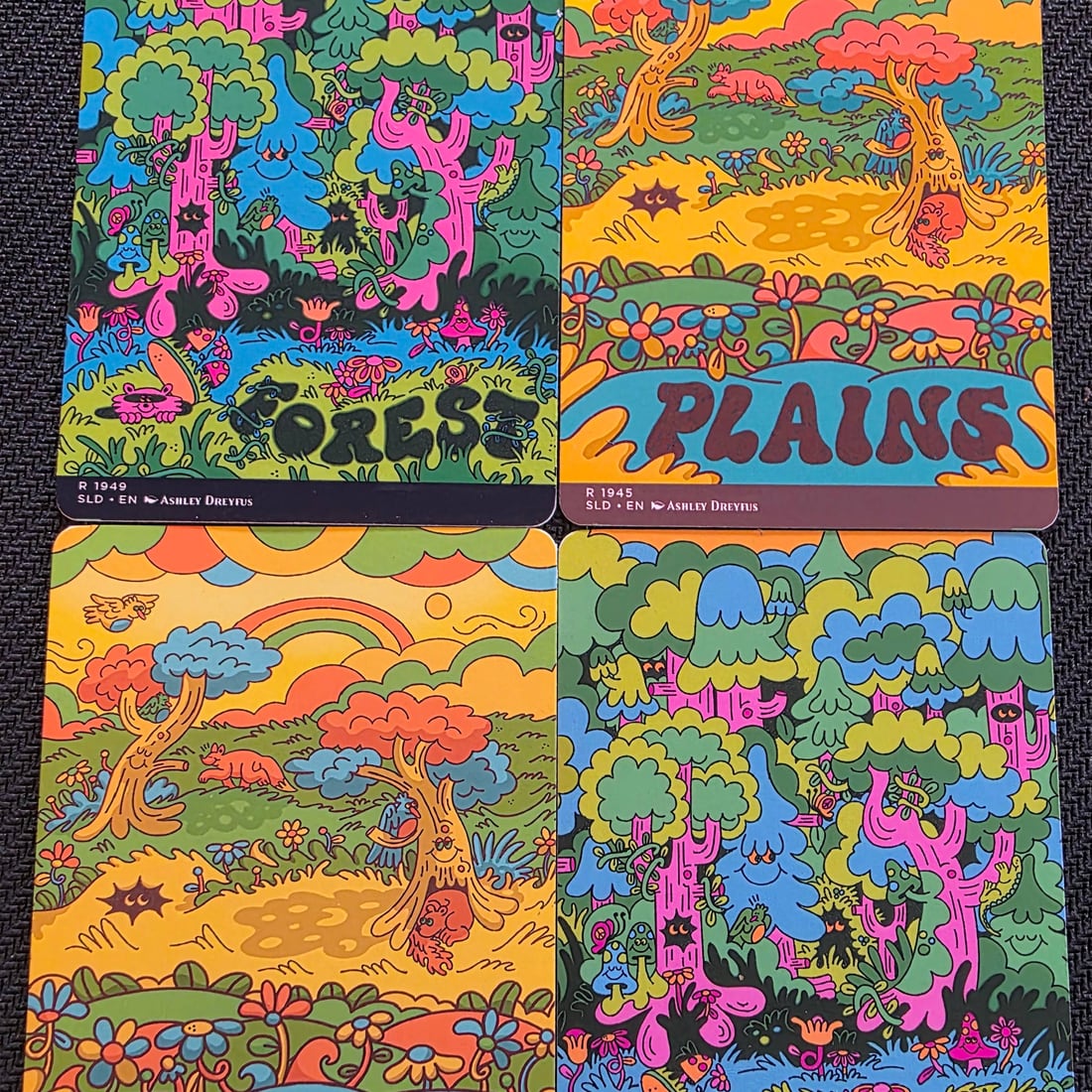 Colourful Secret Lair-style Forest and Plains proxy lands